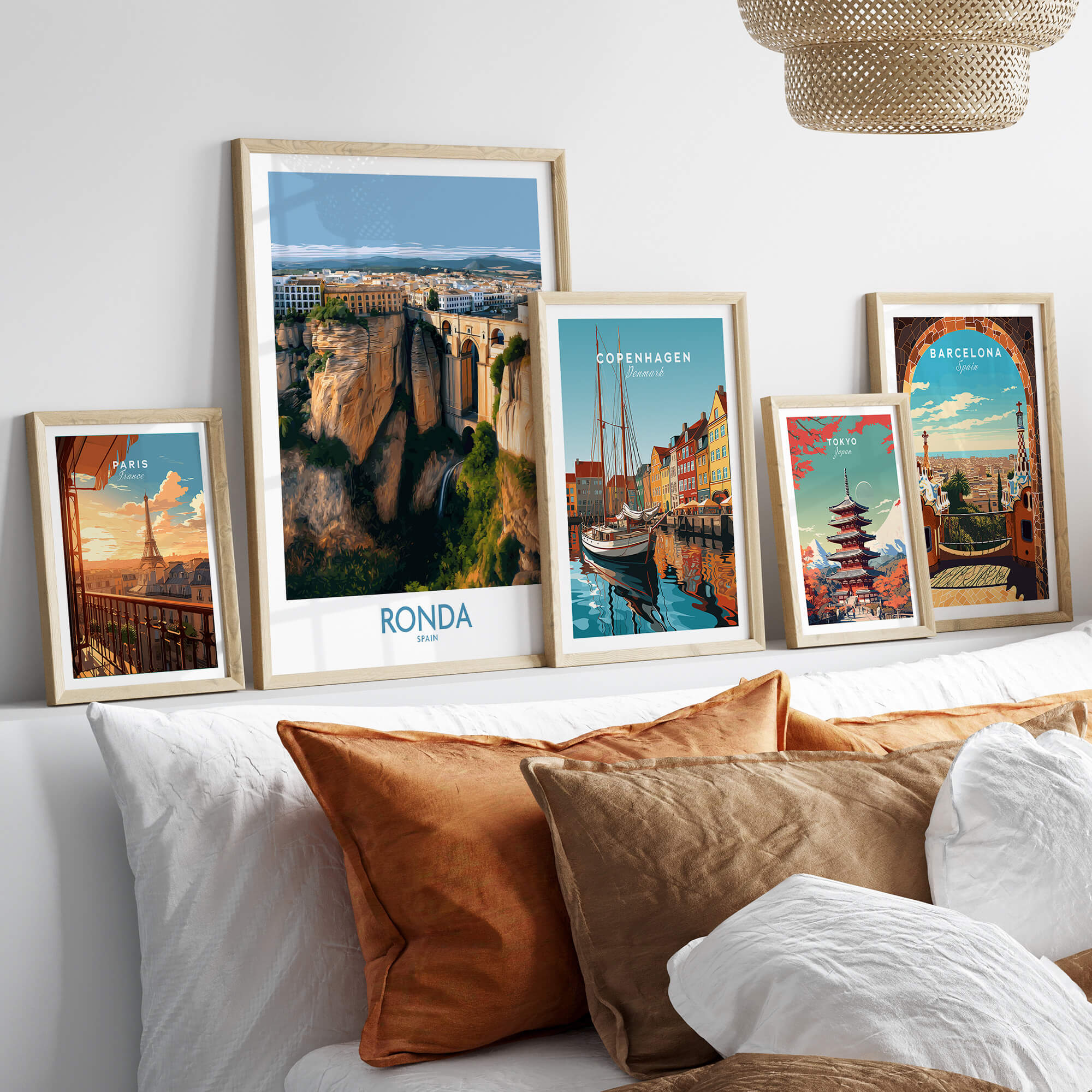 Ronda Spain Poster | Stunning Gorge Landscape Scene Canvas Print showcased with other city posters on a stylish wall.
