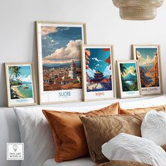 Sucre Bolivia Art Print | Mountain Skyline Poster displayed among travel-themed art prints on a cozy sofa.