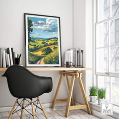 Surrey Hills Poster framed on a wall in a bright room, showcasing beautiful landscapes of the Surrey Hills.
