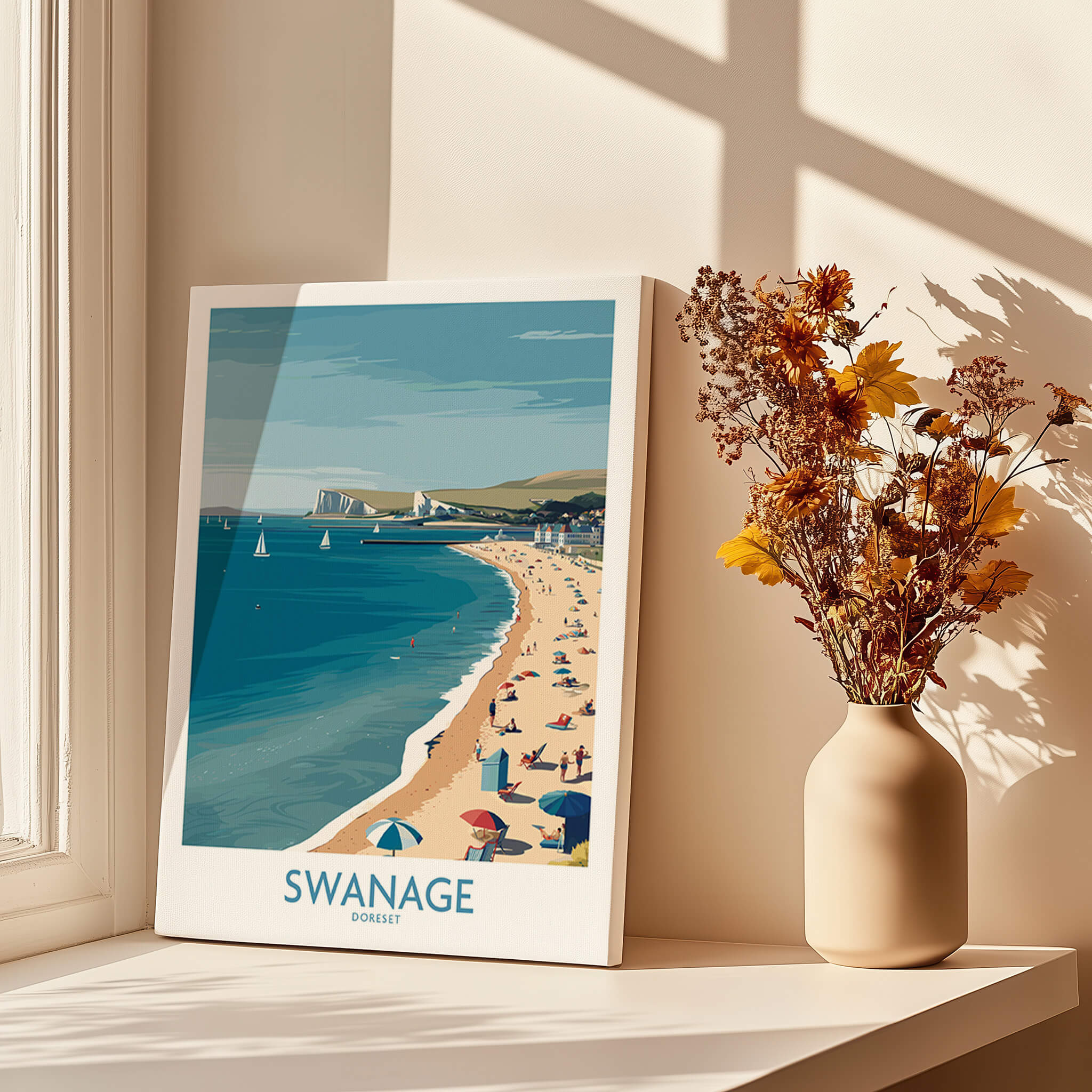 Swanage Dorset Poster | White Cliffs & Coastal Sailboat Scene Canvas Print on a windowsill with flowers.