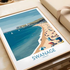 Swanage Dorset Poster | White Cliffs & Coastal Sailboat Scene Canvas Print displayed on a table.