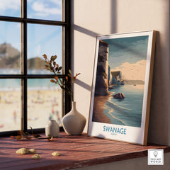 Swanage Poster Dorset | White Cliffs Coastal Landscape Canvas Print displayed on a wooden shelf by a window with a beach view.