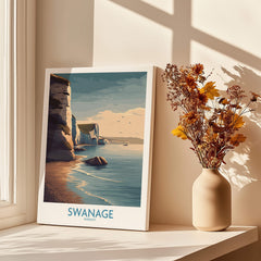 Swanage Poster Dorset | White Cliffs Coastal Landscape Canvas Print displayed near flowers on a windowsill.
