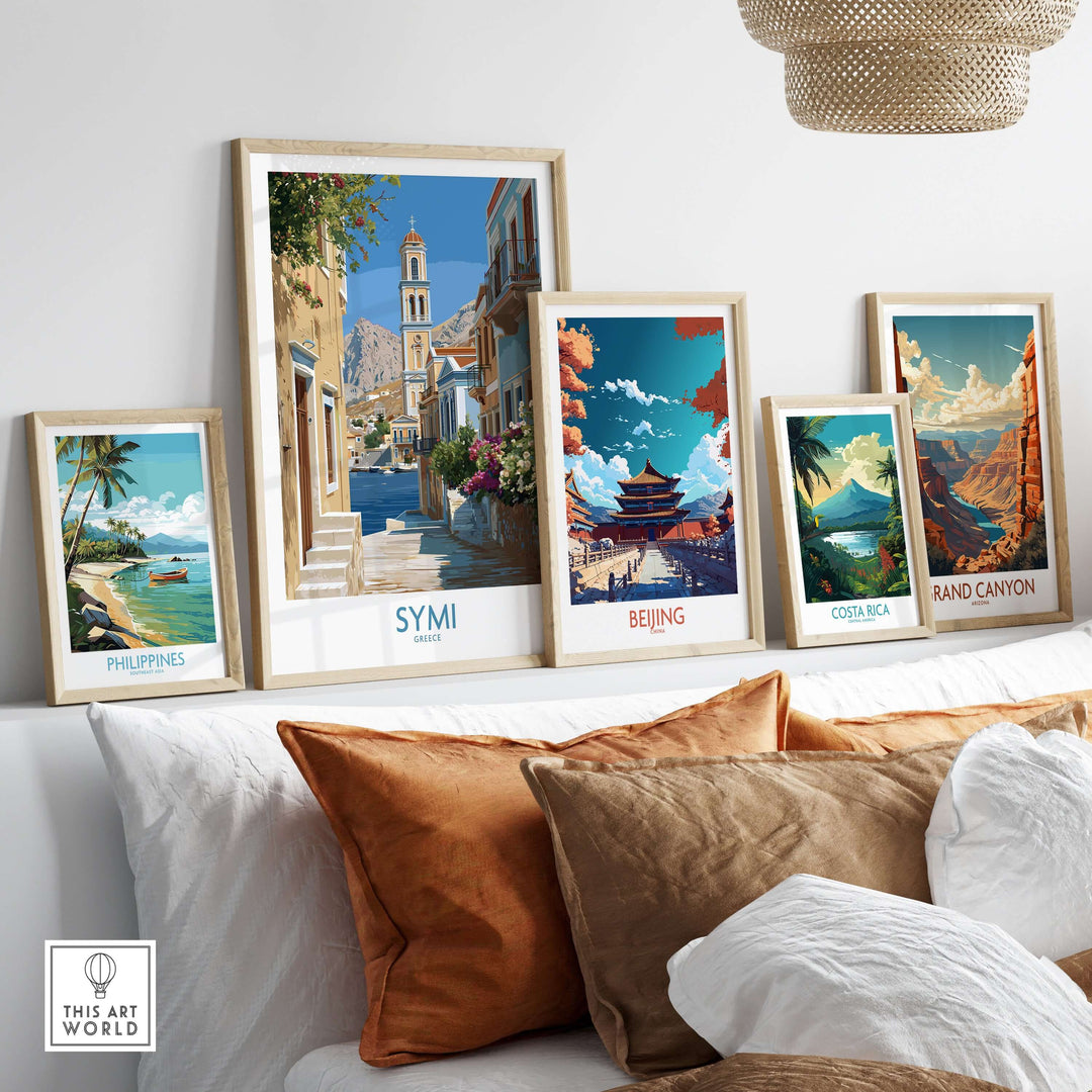 Symi Greece Art Print Greek Poster displayed among other framed travel art prints in a stylish home setting.