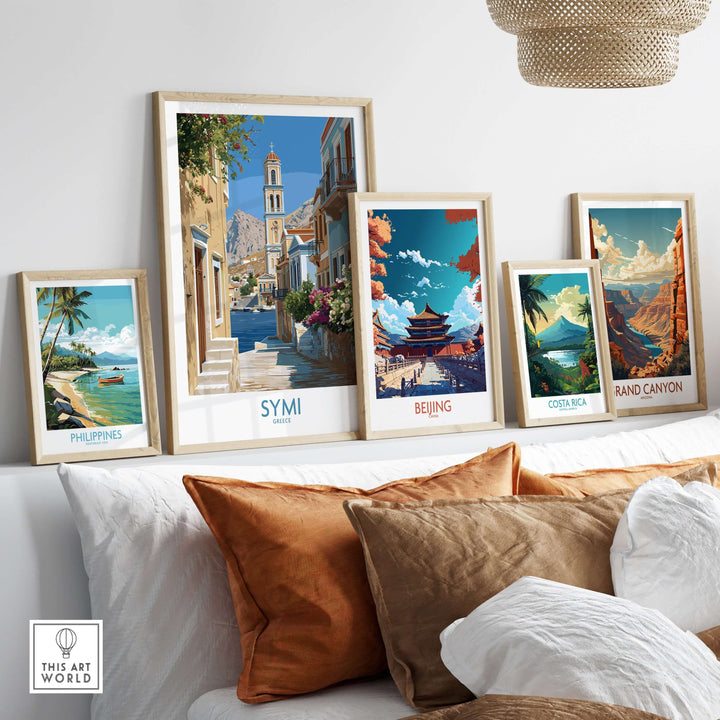 Symi Greece Art Print Greek Poster displayed among other framed travel art prints in a stylish home setting.