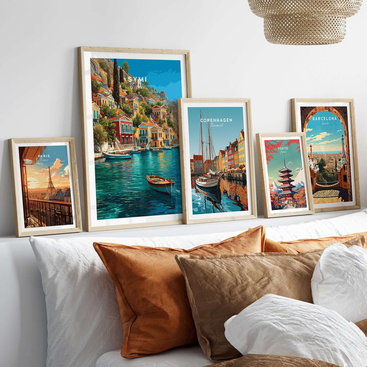 Symi Poster - Aegean Island Print | Greek Travel Wall Art displayed among other travel prints on a stylish wall.