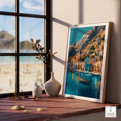 Symi Print Greece artwork featuring vibrant coastal architecture and serene landscape displayed indoors.