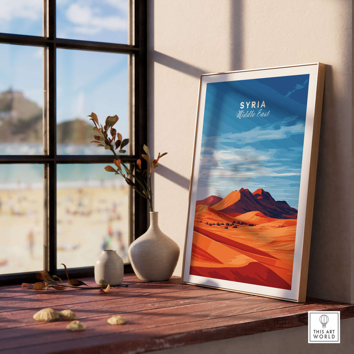 Modern Syria poster featuring Middle Eastern desert art displayed on a windowsill with natural light.