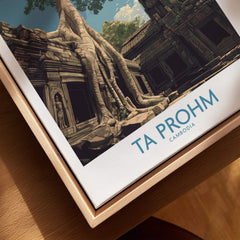 Ta Prohm Cambodia Poster | Sunset Jungle Temple Scene Canvas Print displayed on a wooden frame.