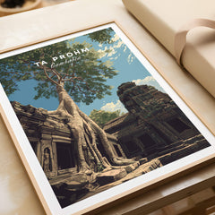 Ta Prohm Wall Art Cambodia Print | Historic Khmer Temple Ruins Travel Poster in a decorative frame with tree and temple.