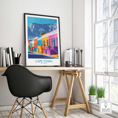 Table Mountain Cape Town poster displayed on a wall above a stylish desk in a modern interior setting.