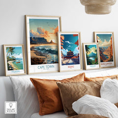Table Mountain print alongside travel art prints from Cape Town, Beijing, Costa Rica, and the Grand Canyon displayed on a couch.