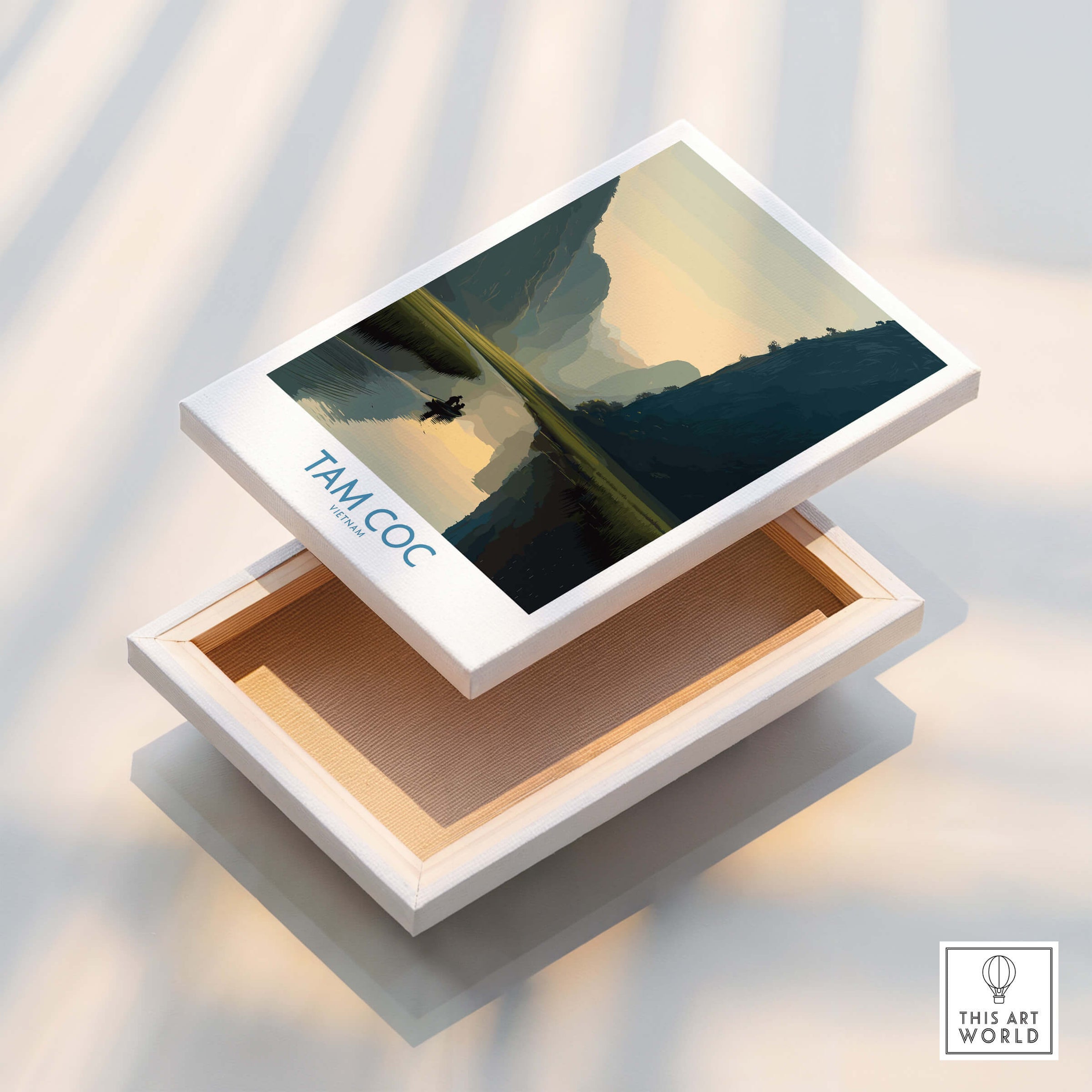 Tam Coc Vietnam Canvas Print | Scenic Boat Ride Landscape Poster displayed on a white box top.