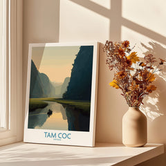 Tam Coc Vietnam Canvas Print | Scenic Boat Ride Landscape Poster displayed in a sunlit room with vase of flowers.
