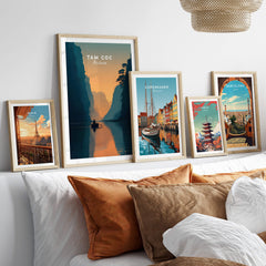 Tam Coc Vietnam Wall Art Print | River Valley Travel Poster showcased among framed prints on a stylish sofa.