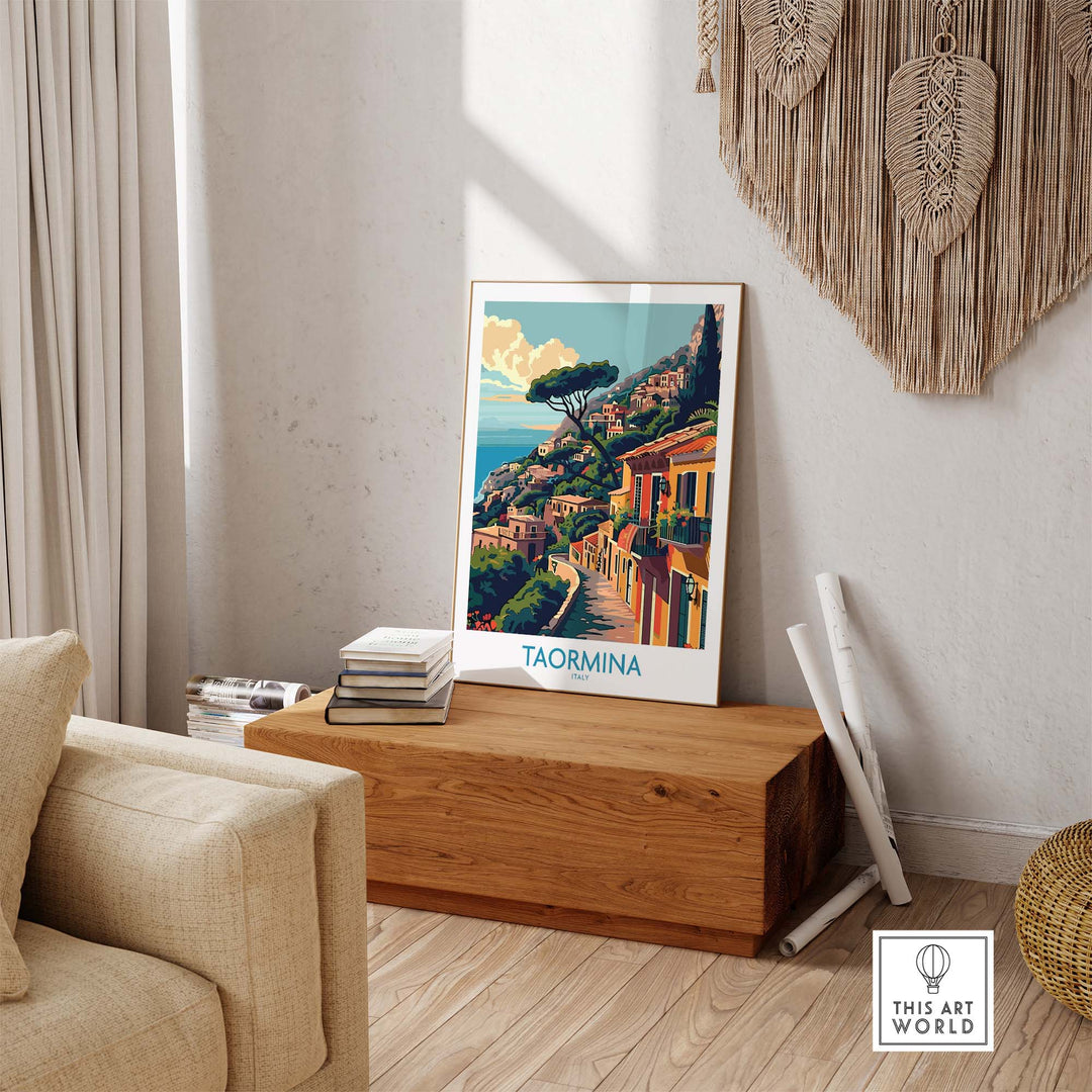 Taormina Travel Print showcasing Italy's beautiful coastline, placed in a cozy living room setting with earthy decor.