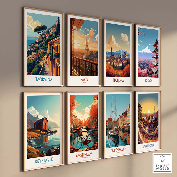 Gallery wall with vibrant travel prints of Taormina, Paris, Florence, Tokyo, Reykjavik, Amsterdam, Copenhagen, and Barcelona by This Art World