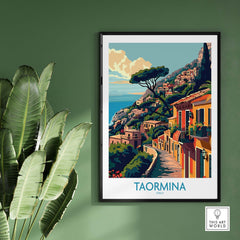 Taormina Travel Print - Vibrant Souvenir of Italys Beautiful Coastline displayed on a wall with lush greenery.