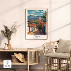 Tarija Bolivia Print | City Travel Poster displayed in a stylish living room setting with a rattan chair and decorative elements.