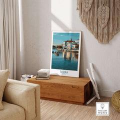 Tavira Algarve Poster, Portugal Travel Print, Wall Art displayed in a cozy living room setting with wooden accents.