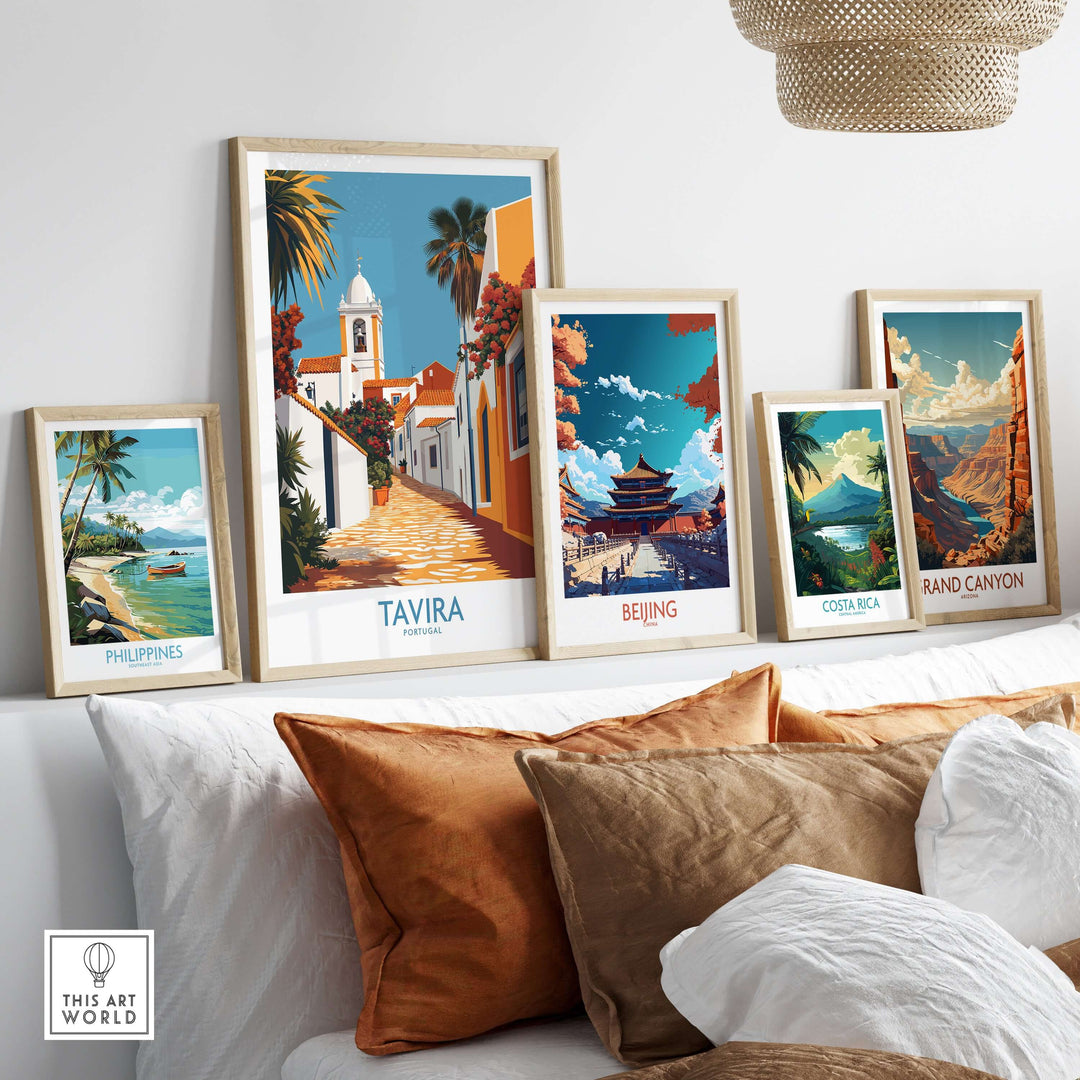 Tavira Old Town poster and travel prints showcased on a stylish shelf with decorative pillows.