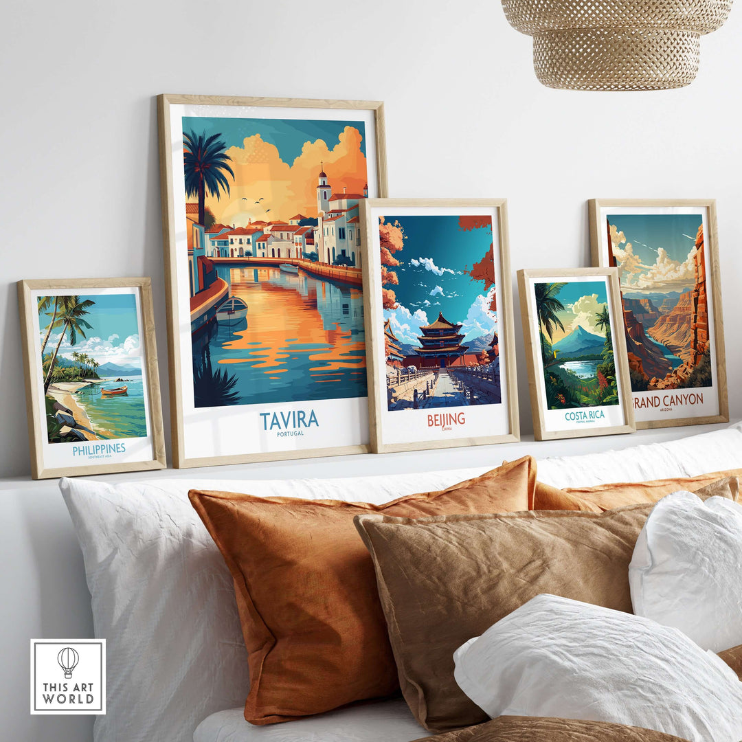 Gallery wall featuring Tavira, Portugal travel print and other global landscape art pieces.