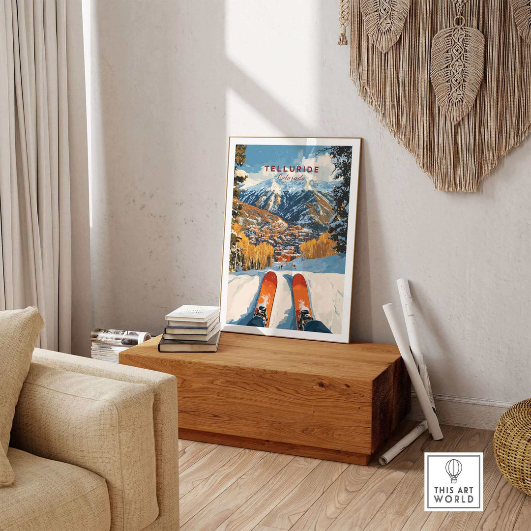 Telluride Ski Poster displayed on a wooden bench in a cozy living room setting with mountain scenery artwork.