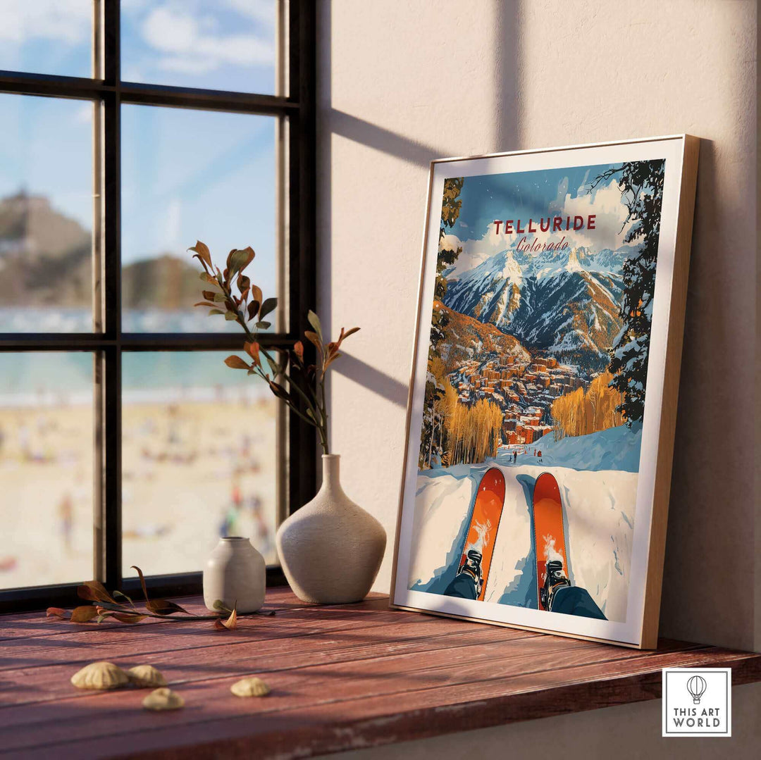 Telluride Ski Poster displayed on a windowsill with a scenic winter landscape, perfect for ski enthusiasts and art lovers.