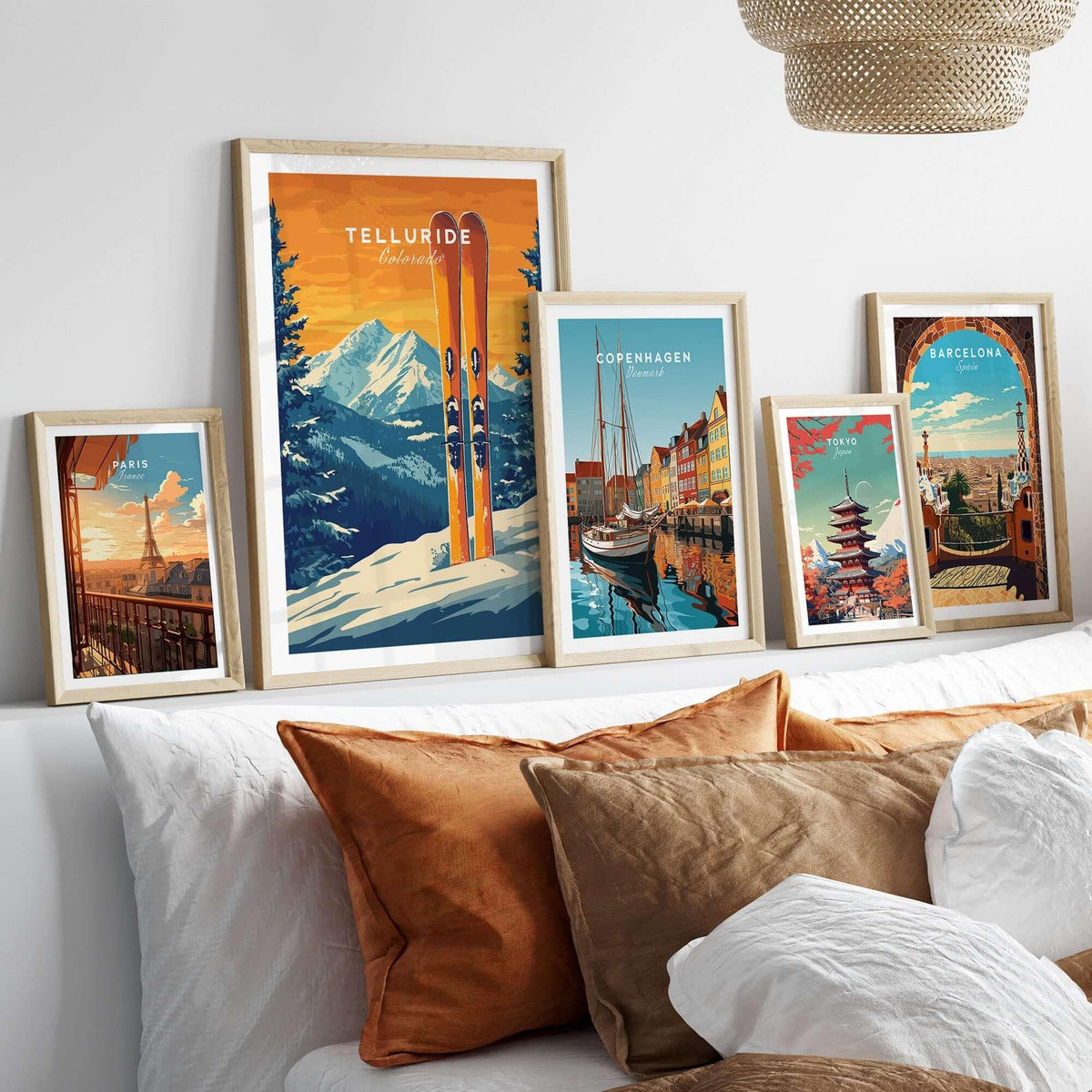 Framed Telluride travel poster alongside other vibrant city posters in a cozy decor setting. Perfect for home or office.