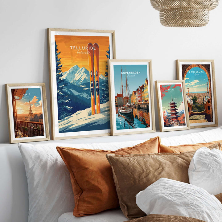 Framed Telluride travel poster alongside other vibrant city posters in a cozy decor setting. Perfect for home or office.