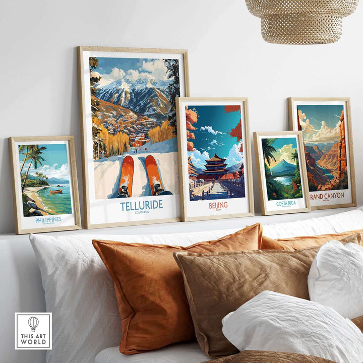 Telluride wall art ski poster displayed with other travel-themed posters on a stylish living room shelf.