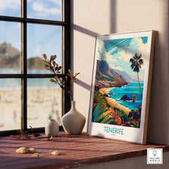 Tenerife - Canary Islands Poster displayed on a windowsill with a view of the beach and mountains in the background.