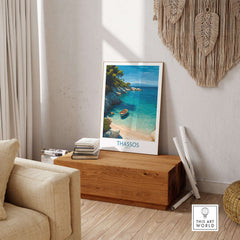 Thassos Greece Art Print featuring a serene beach scene with golden sands and blue waters in a cozy living room setting.