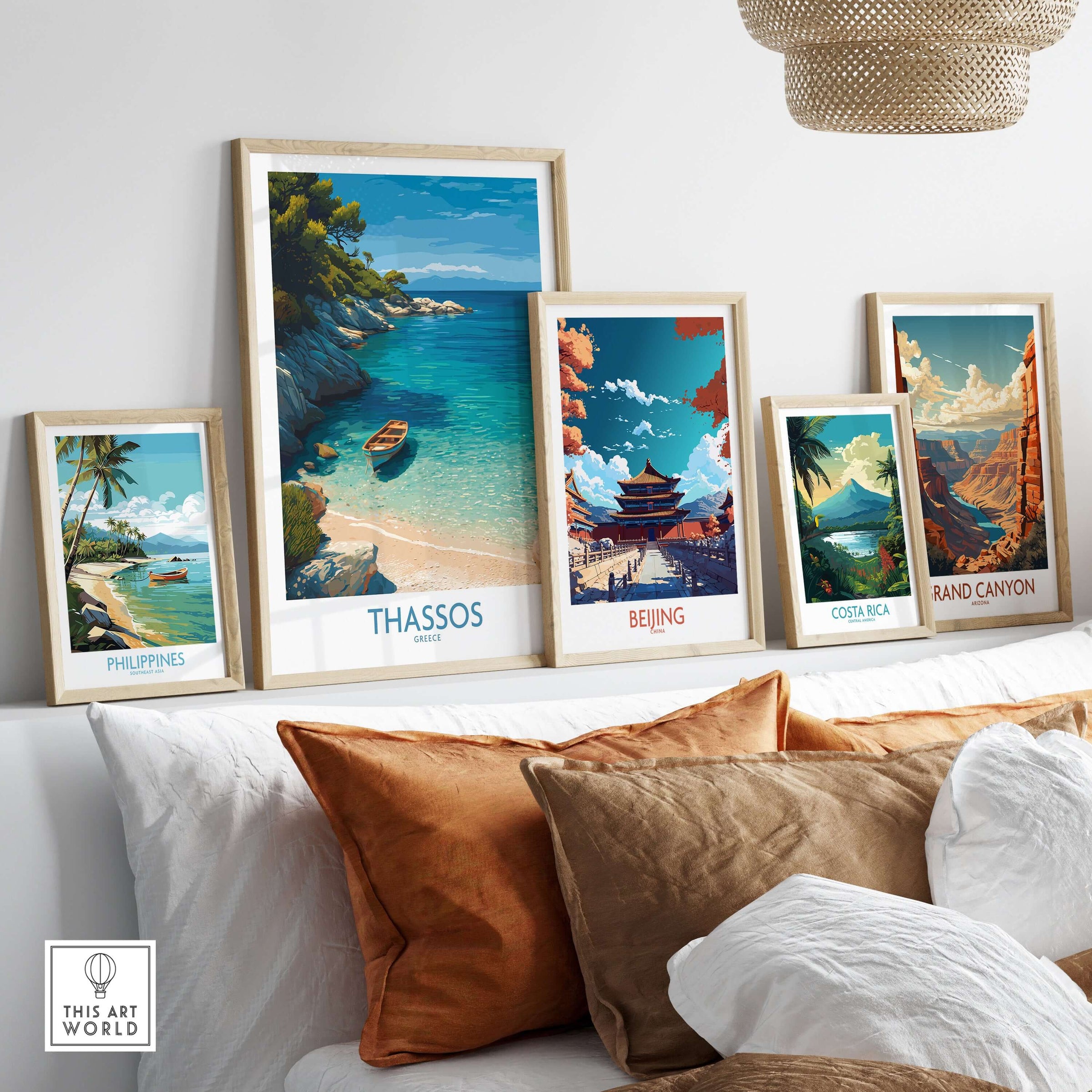 Thassos Greece Art Print displayed among other travel art prints on a cozy couch, showcasing a serene beach scene.