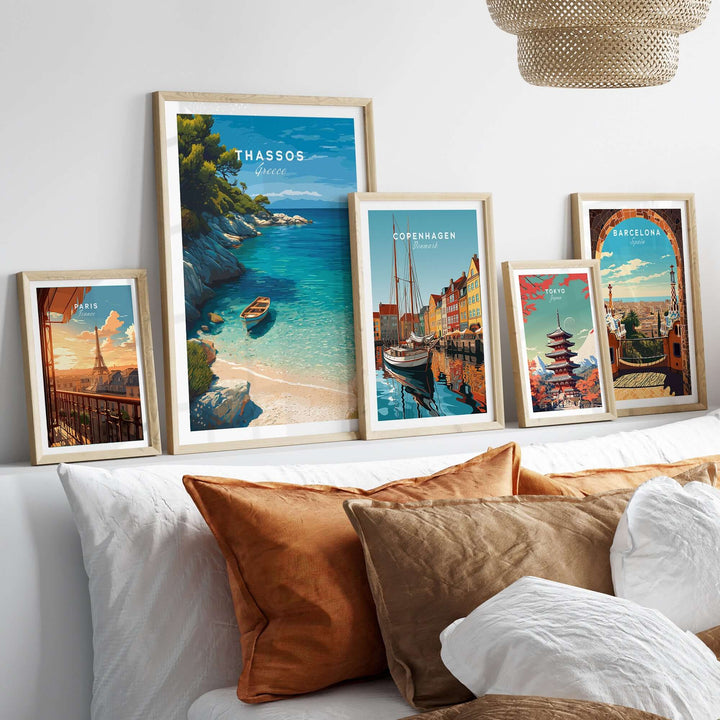 Thassos Print | Greek Island Travel Wall Decor displayed among other travel prints on a cozy sofa.