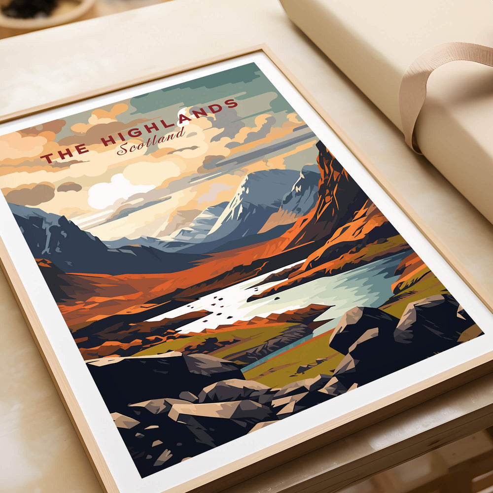 The Highlands Scotland Mountain River Art Print | Glencoe Landscape Poster displayed on a table.
