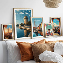 Thessaloniki Print | Greek City Home Decor - White Tower in a stylish living room adorned with various framed city prints.