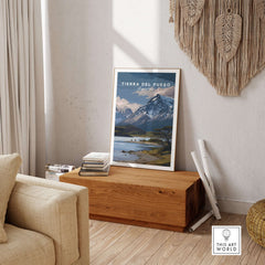 Tierra del Fuego Print | Ushuaia Travel Wall Art displayed in a cozy living room on a wooden table.