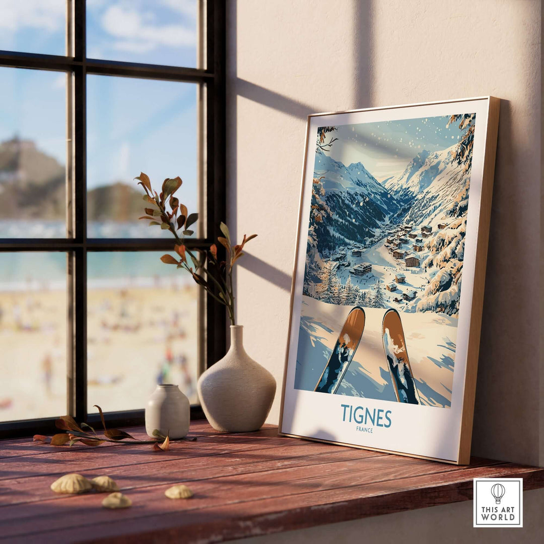 Tignes Print France ski poster displayed on a windowsill, showcasing snowy mountains and scenic views of Tignes, perfect for adventure lovers.