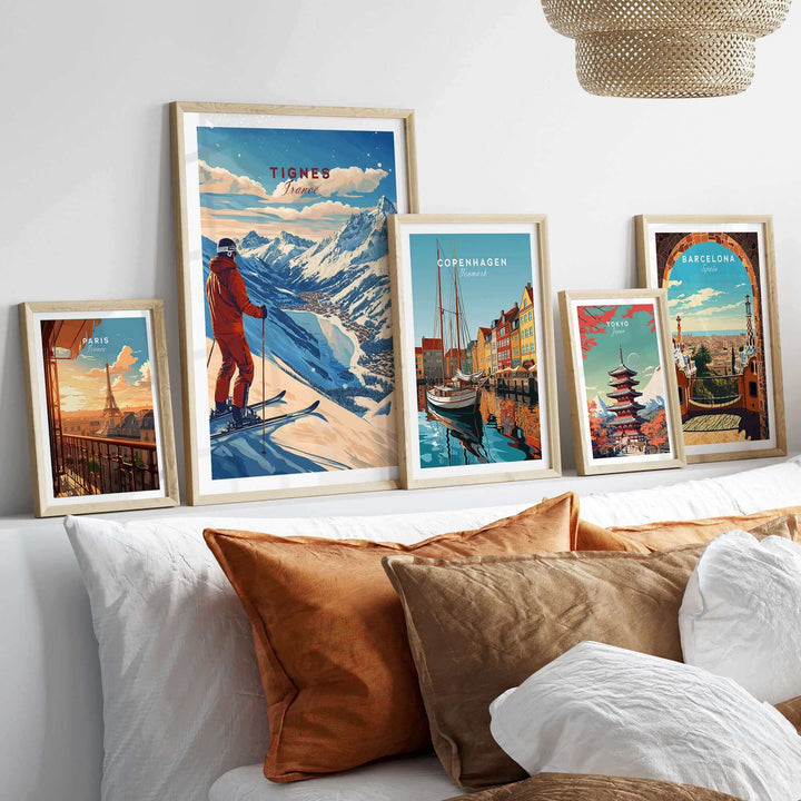 Gallery display featuring Tignes Print France Ski Poster alongside other travel-themed art prints above a cozy couch.