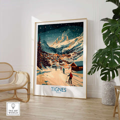 Tignes wall art ski poster featuring a snowy mountain landscape with skiers, displayed in a modern living room setting.