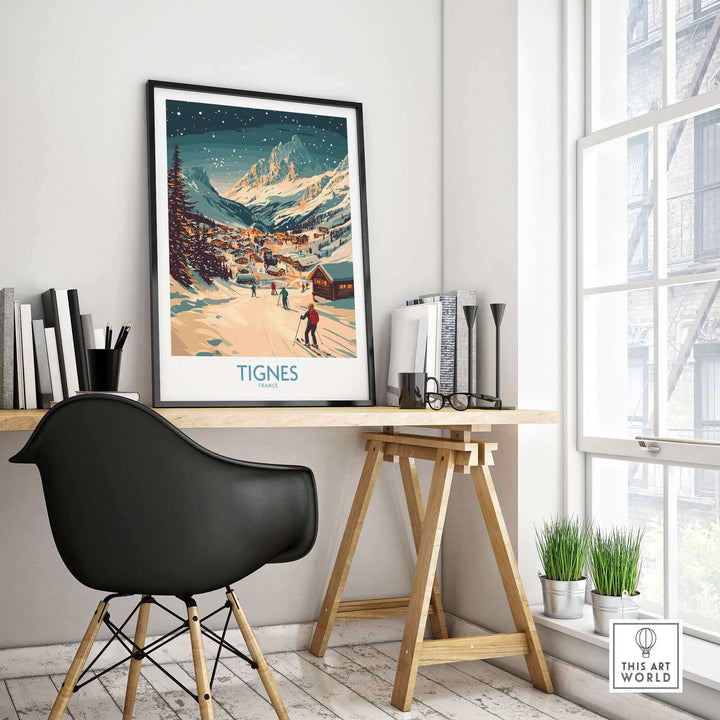 Ski-themed Tignes wall art poster displayed in modern interior with desk and chair, highlighting alpine landscape and snowy village.