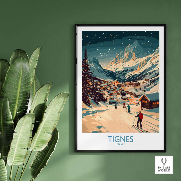 Tignes wall art ski poster depicting a snowy mountain village scene with skiers under a starry sky, framed on a green wall.