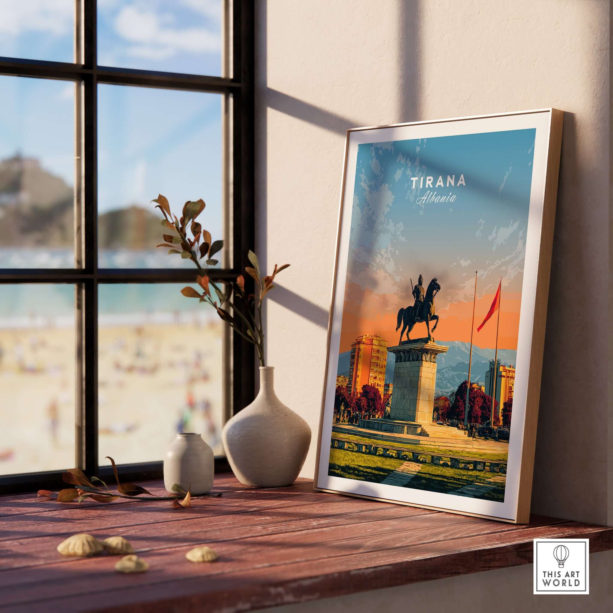 Tirana City Sunset Canvas Art Print | Albanian Travel Wall Decor displayed on a wooden table by a window.