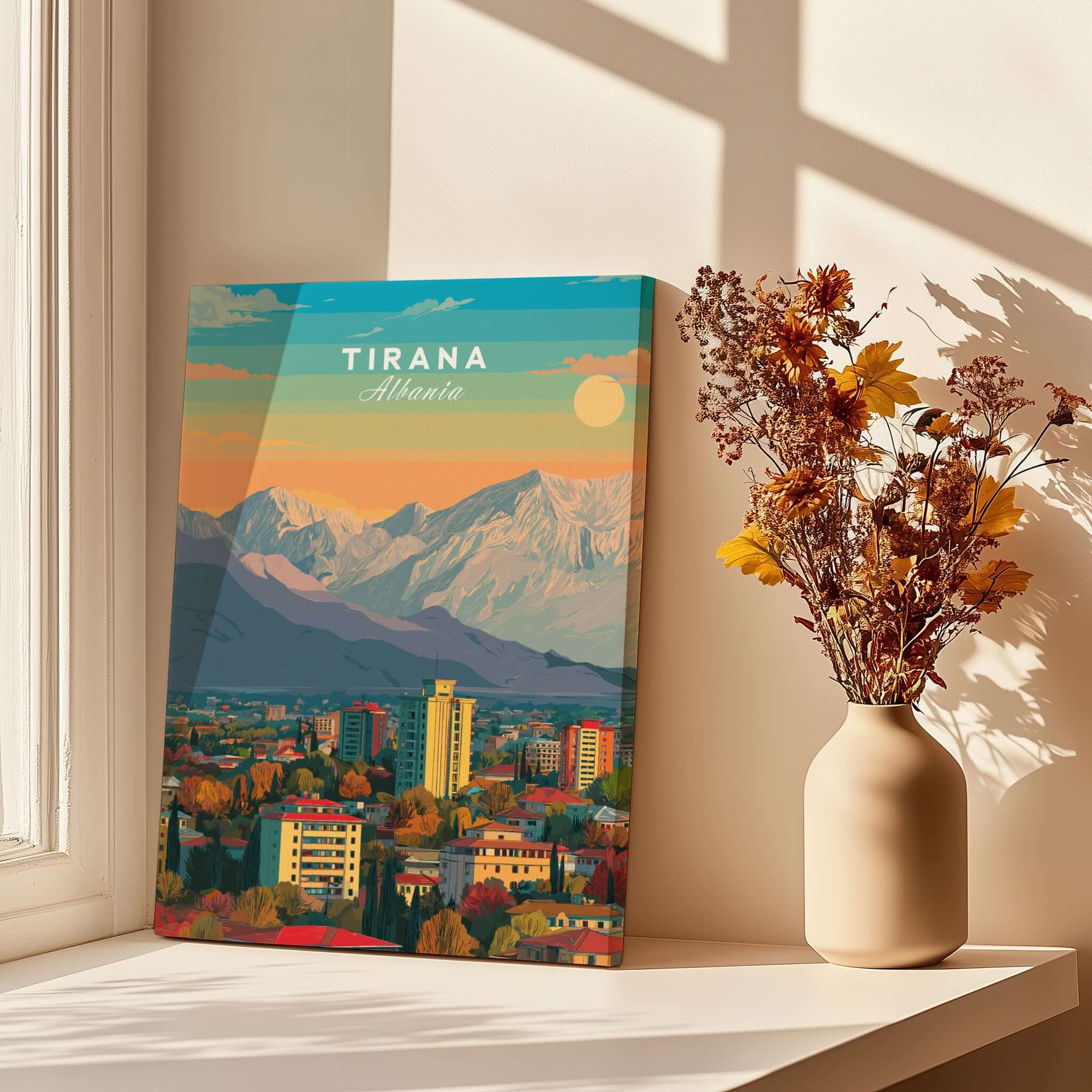 Tirana Cityscape Canvas Print | Albanian Home Wall Art displayed beside a flower vase, showcasing Albania's vibrant landscape.