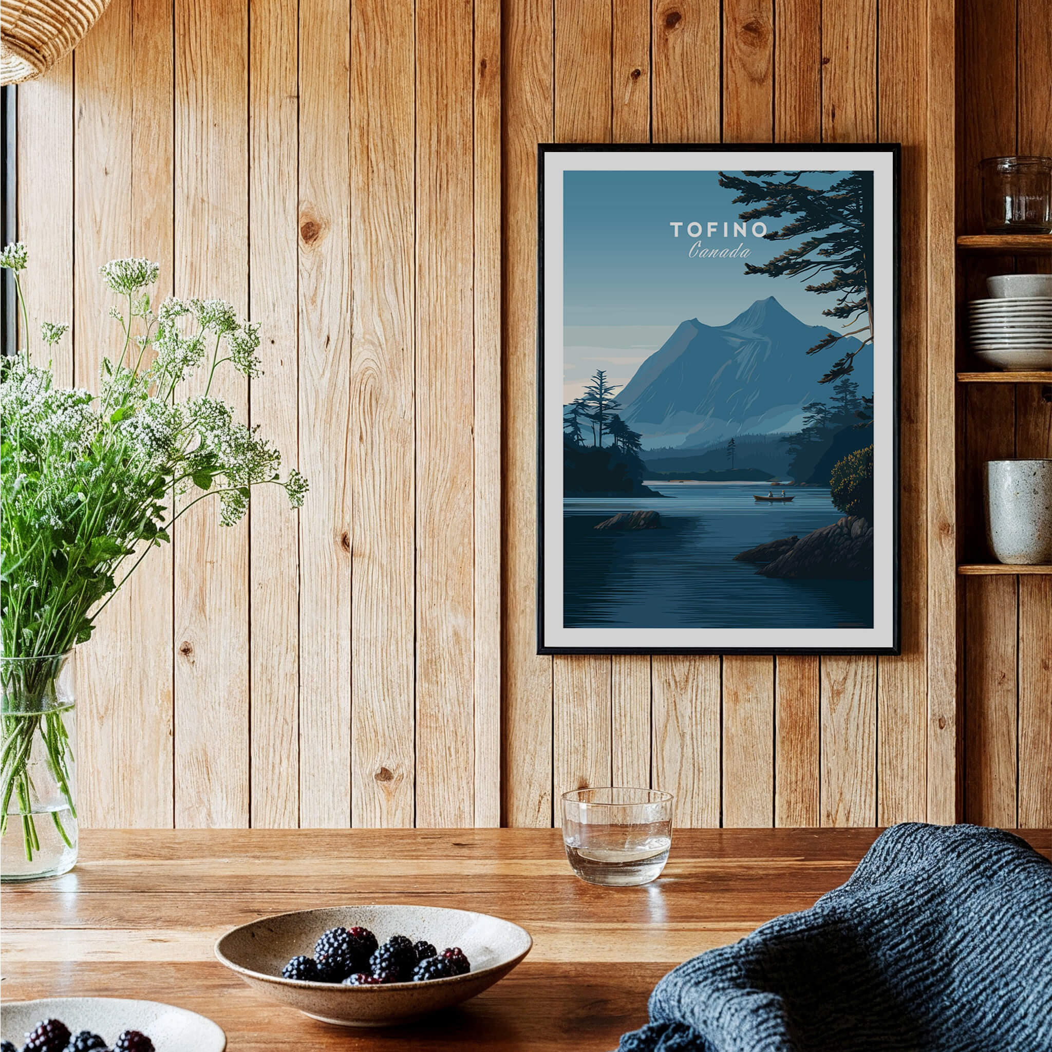 Tofino Canada Wall Art Print | Wilderness Lake and Mountain Travel Poster framed on a wooden wall with greenery.