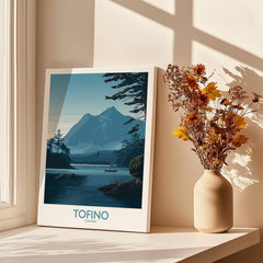 Tofino Canada Poster | Serene Canoe Landscape Scene Canvas Print in a bright room with a vase of flowers.