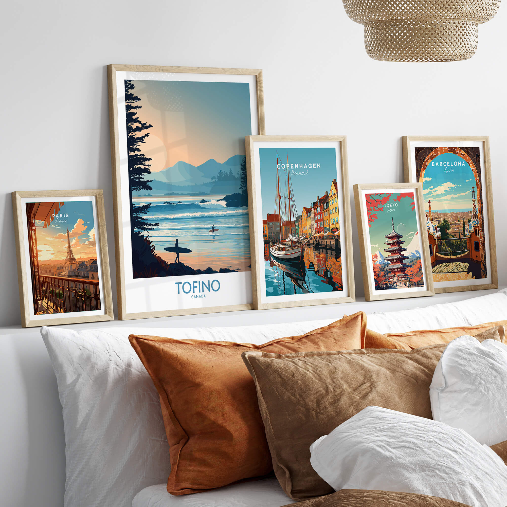 Tofino Canada Poster | British Columbia Coastal Sunset Canvas Print displayed with other travel posters in a cozy living room setting.