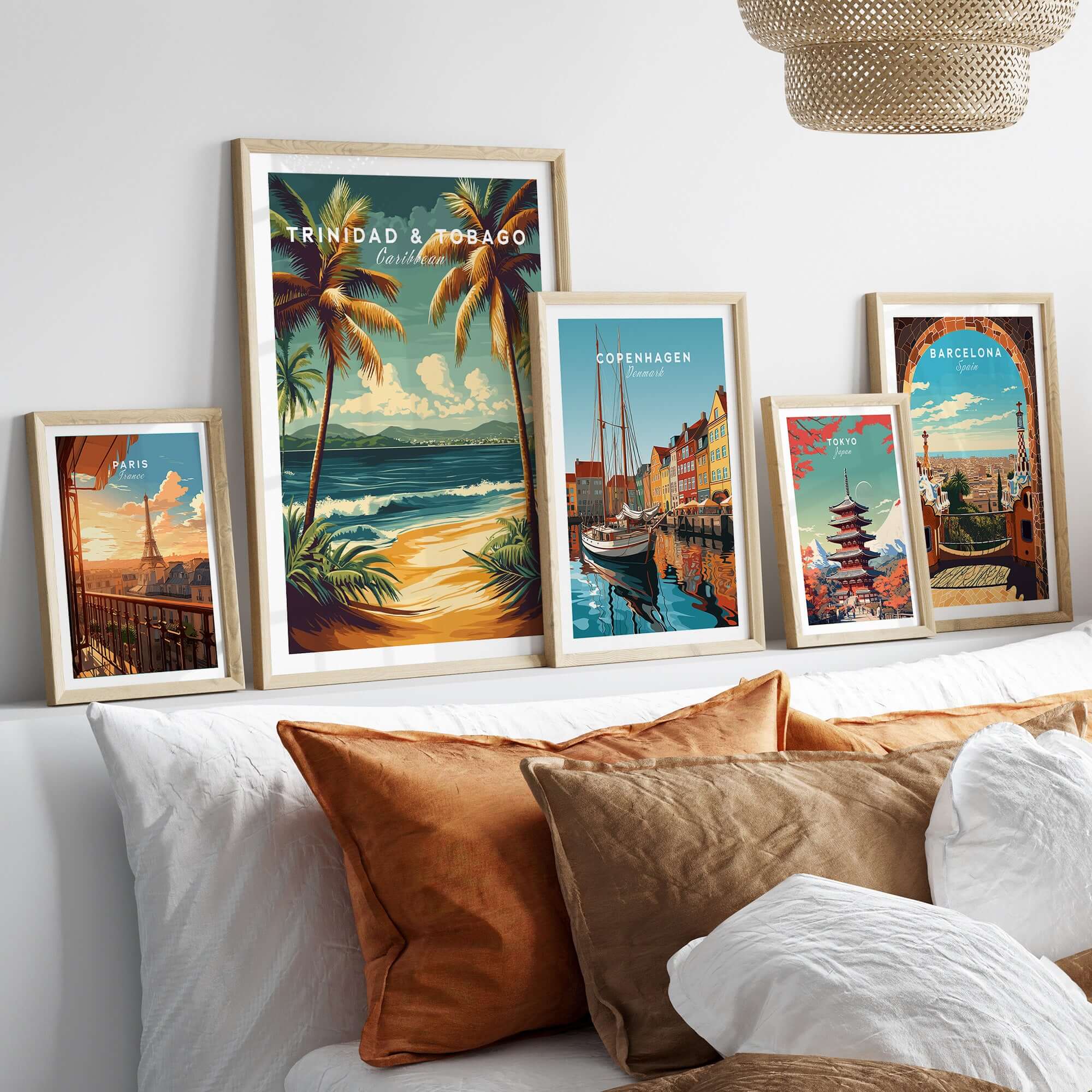Trinidad & Tobago Print | Caribbean Home Decor displayed among other vibrant travel prints on a stylish sofa.