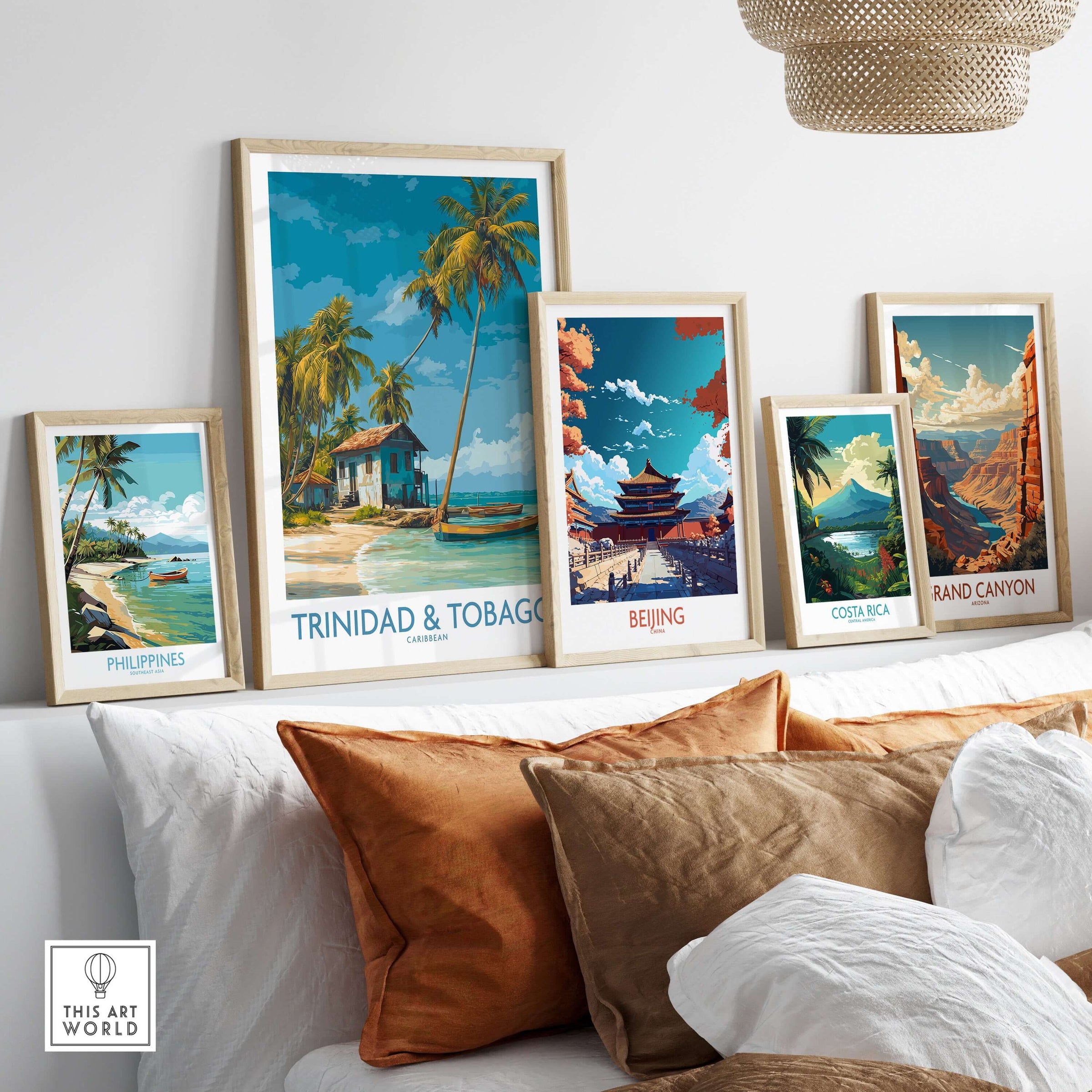 Trinidad & Tobago Caribbean Art Print | Tropical Palm Tree Poster displayed among other travel posters on a cozy sofa.